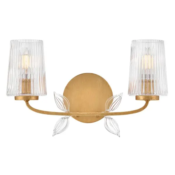 Feminine and romantic, Aliso’s thin, delicate frame is adorned with dainty, clear, pressed glass leaves. A hand-painted Distressed Brass finish enhanced by gold leaf makes a polished and luxurious statement in both traditional and modern settings