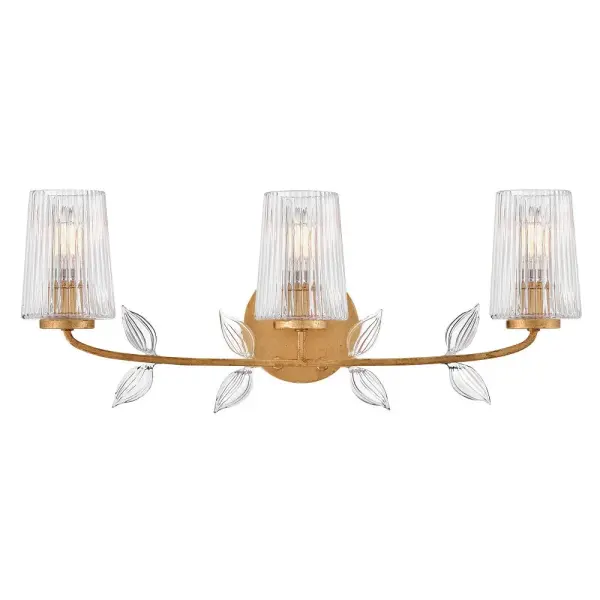 Feminine and romantic, Aliso’s thin, delicate frame is adorned with dainty, clear, pressed glass leaves. A hand-painted Distressed Brass finish enhanced by gold leaf makes a polished and luxurious statement in both traditional and modern settings