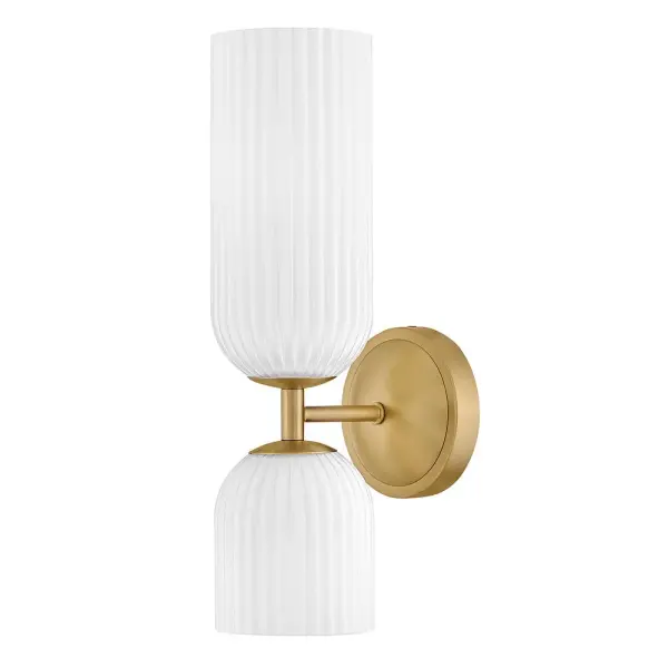 The graceful curves of Ava’s transitional ribbed glass shades are balanced by a sleek silhouette and stepped backplate. A hand-painted Lacquered Brass finish complements the Clear or Cased Opal glass with warm metallic tones, creating a timeless look that complements any décor style. - alternate view