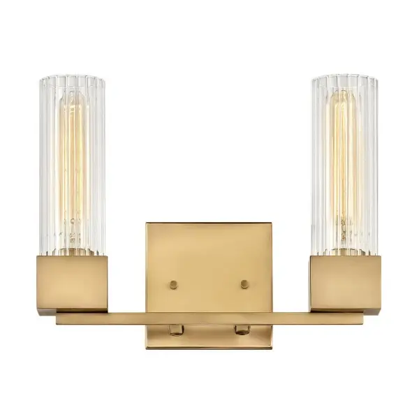 A cubed base design that is definitely not square! The crisp, contemporary lines of Xander pair perfectly with elegant ribbed clear glass to create a throwback style statement that is most definitely updated and upscale. Pick Polished Nickel or Heritage Brass finish to set the bar high when it comes to a modern vintage masterpiece.