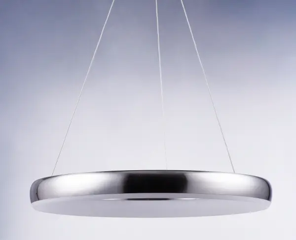 The Innertube pendant features a distinctive doughnut-shaped ring design in Satin Nickel with integrated LEDs angled to provide uniform, diffused lighting. Its contemporary aesthetic and 24-inch diameter make it versatile for various spaces. - alternate view