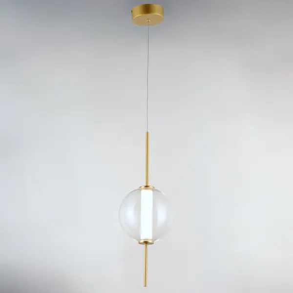 The Axle pendant combines contemporary minimalism with a touch of whimsy through its unique gold pin suspension system. The clear glass orb houses an evenly diffused LED cylinder, creating clean, modern illumination perfect for intimate spaces. - alternate view