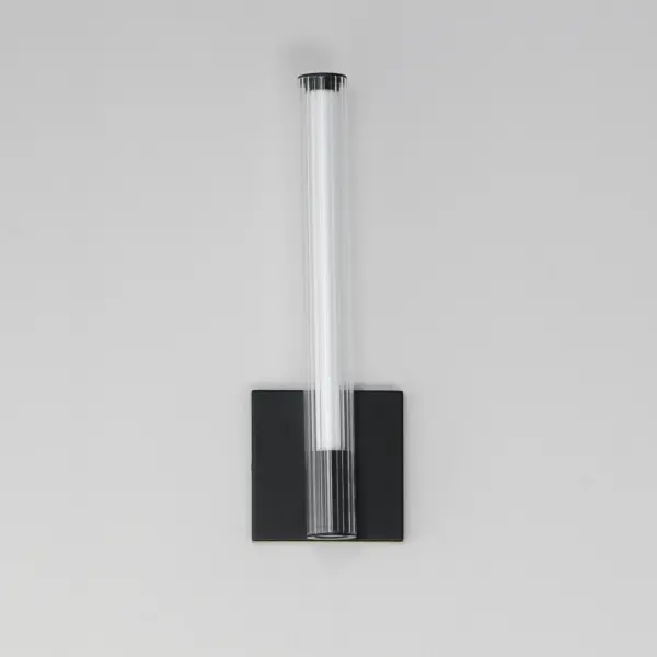 The Cortex sconce combines sculptural ribbed glass with functional dual-direction lighting. Its opal diffuser provides ambient illumination while a recessed downlight adds task lighting, making it ideal for bathrooms and hallways. - alternate view