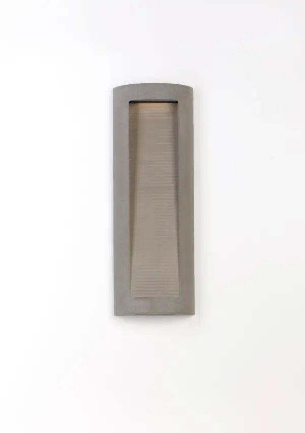 The Boardwalk wall sconce combines industrial concrete construction with efficient LED technology, making it ideal for harsh coastal environments. Its contemporary aesthetic and durable materials ensure long-lasting performance. - alternate view