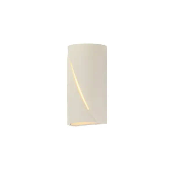 The Puff outdoor wall sconce combines architectural concrete construction with sophisticated lighting design. Its softly rounded form and diagonal reveal create ambient up/down lighting while adding sculptural interest to exterior spaces.