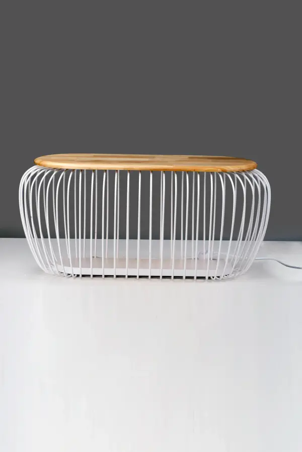 This dual-purpose piece combines seating with ambient LED lighting, featuring a heavy-gauge white wire cage design and wood top. Perfect for creating a statement in outdoor living areas or modern interiors. - alternate view