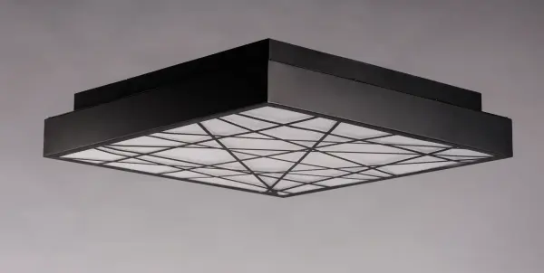 This large-scale LED flush mount delivers exceptional illumination with 4900 lumens, perfect for spacious interiors. The black finish and decorative Inca pattern bottom add contemporary style while providing practical, energy-efficient lighting. - alternate view