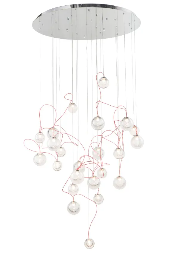 The Bobble pendant transforms lighting into art with 24 bubble glass spheres suspended on contrasting red cords. Its avant-garde design creates a galaxy-like effect, perfect for dramatic spaces needing a bold focal point.