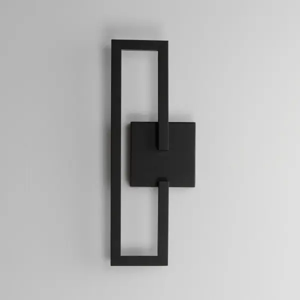 The Penrose wall sconce transforms mathematical precision into artistic form with its geometric cube-inspired design. Integrated LED channels deliver warm, efficient light while the aluminum and steel construction ensures durability. - alternate view