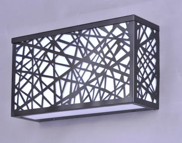 The Inca LED Wall Sconce combines contemporary design with artisanal craftsmanship. Its precision laser-cut bronze sheath encases brilliant crystal, creating a radiant glow perfect for outdoor spaces. Energy-efficient LED technology delivers warm 3000K light. - alternate view