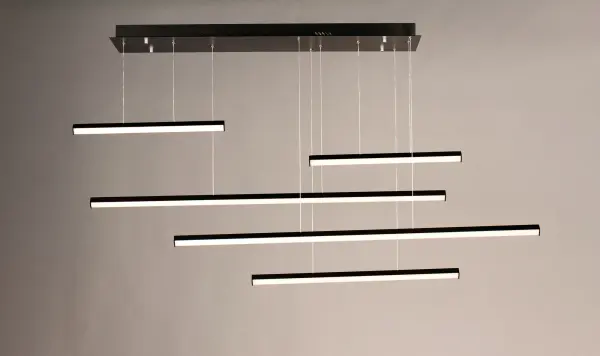 The Hover pendant features minimalist aluminum batons with V-shaped acrylic diffusers that create a wider light distribution. Its modular design allows for creative arrangements, making it a unique sculptural statement piece. - alternate view