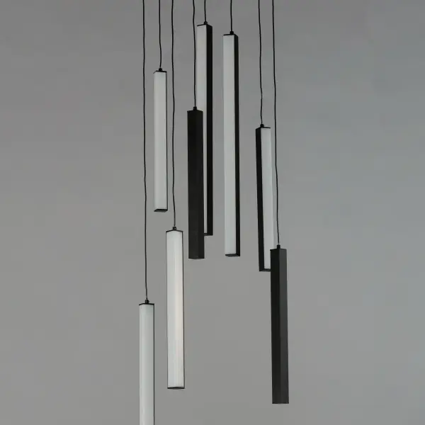 The Hover pendant features minimalist aluminum batons with V-shaped acrylic diffusers that create a wider light beam. Its modular design allows for creative arrangements, making it a unique sculptural statement piece for contemporary spaces. - alternate view
