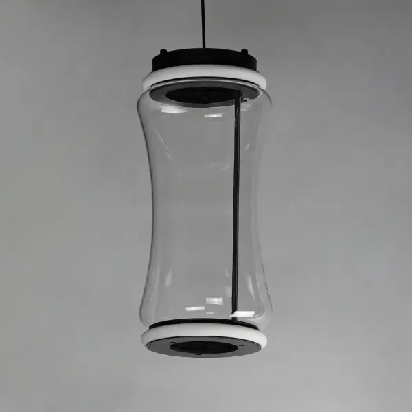 The Syndicate pendant combines hand-blown hourglass glass shades with bright LED rings in Matte Black. Its undulating pattern and transparent glass create visual interest while providing efficient LED illumination. - alternate view