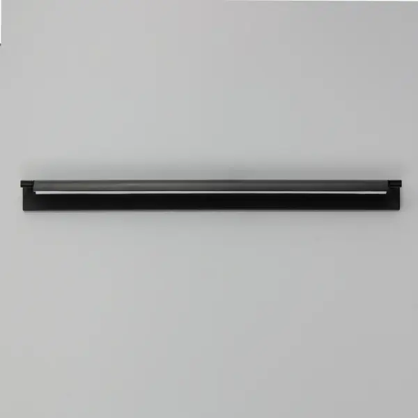 The Bookkeeper combines functional directional lighting with sleek contemporary design. Its curved metal panel precisely directs 1460 lumens of warm 3000K light, making it ideal for artwork, vanity, or accent lighting. - alternate view