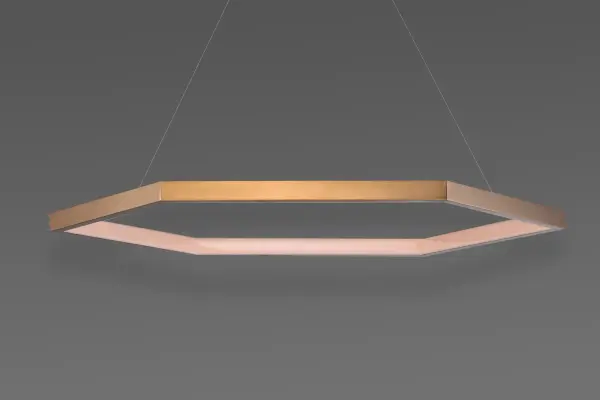 The Hex Suspension Pendant features multiple hexagonal rings in brushed champagne finish, creating a sophisticated geometric focal point. At 40 inches, this large-scale LED fixture delivers 2100 lumens of warm 3000K light, perfect for contemporary residential and commercial spaces. - alternate view