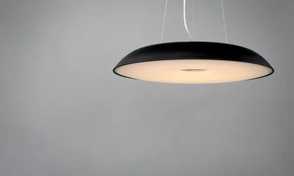 The Dimple pendant combines clean modern design with powerful LED illumination. Its matte black finish and white acrylic diffuser create a striking contrast, while the polished chrome finial adds a refined detail. - alternate view