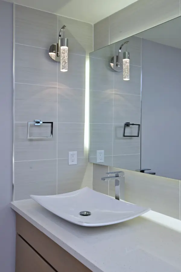 The Fizz IV delivers 30% more light output than its predecessor with energy-efficient LED technology and distinctive bubble glass styling. Perfect for modern bathrooms and hallways seeking functional elegance. - alternate view
