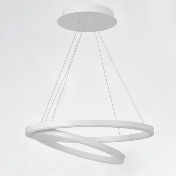 The Cirque pendant features interlocking matte white rings that create a striking architectural statement. Integrated LED technology delivers 4690 lumens of warm light through continuous acrylic bands, perfect for modern interiors. - alternate view
