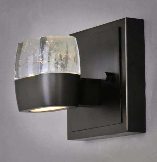 The Volt LED vanity combines modern design with practical functionality, featuring oval die-cast cups and bubble glass shades. Dual LED modules provide both upward ambient lighting and downward task lighting for optimal bathroom illumination. - alternate view
