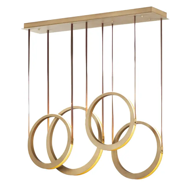 The Tether pendant combines industrial materials with refined design, featuring tapered brass rings suspended by leather straps. Concealed LEDs create dramatic indirect lighting that illuminates neighboring rings and spaces above and below.
