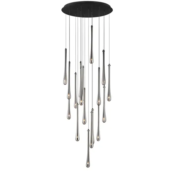 The Stillo transforms any space with 18 elongated hand-blown glass pendants featuring mirror smoked glass and matte black metalwork. Dense glass walls create dramatic visual impact while energy-efficient LED G4 lamps provide warm illumination.