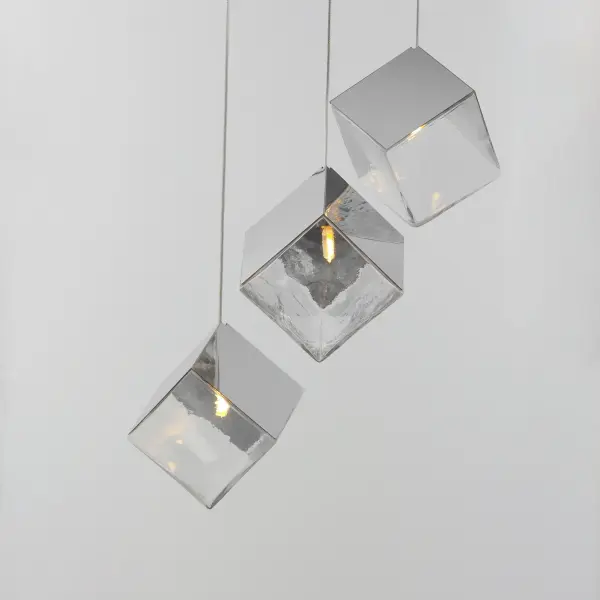 The Ice Cube pendant brings architectural drama with oversized cast glass cube shades suspended from polished stainless steel frames. Its clean geometric design and reflective chrome finish create visual interest while providing efficient LED illumination. - alternate view