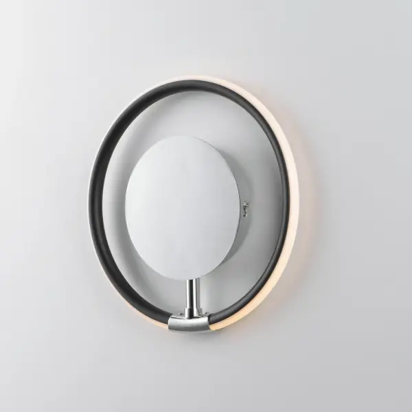 The Ringer LED Wall Sconce features adjustable rings in black with polished chrome accents, creating customizable lighting configurations. Energy-efficient LED strips provide warm 2700K illumination while the contemporary design adds visual interest. - alternate view