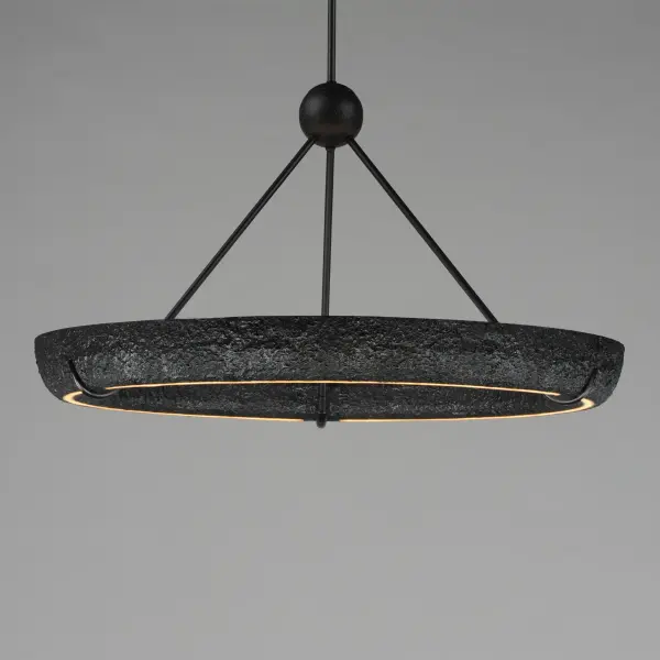 The Geist Ring Pendant delivers impressive scale and modern sophistication with its 36-inch diameter LED ring design. Combining gypsum and steel construction in a sleek black finish, it provides 2700 lumens of warm 3000K light. - alternate view