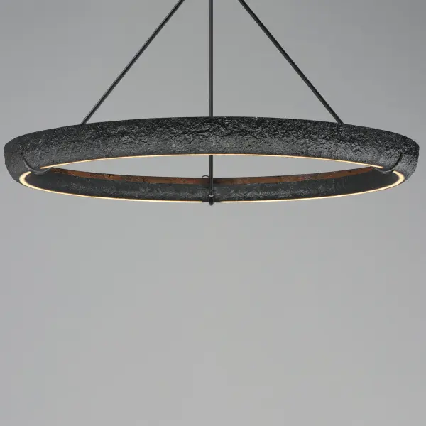 The Geist Ring Pendant delivers impressive scale and modern sophistication with its 48-inch diameter LED ring design. Combining gypsum and steel construction in a sleek black finish, it provides substantial illumination while serving as architectural sculpture. - alternate view