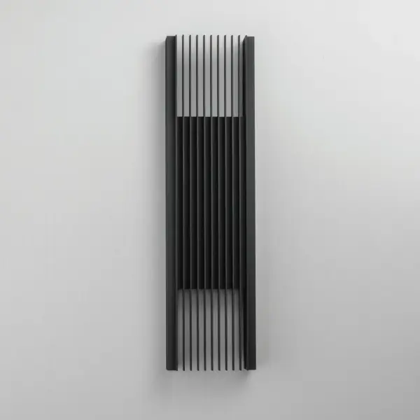 The Rampart XL delivers dramatic architectural lighting with its sharp rectilinear design and dual-direction LED illumination. Perfect for modern exteriors, this substantial sconce creates captivating light patterns while providing 1000 lumens of warm 3000K light. - alternate view