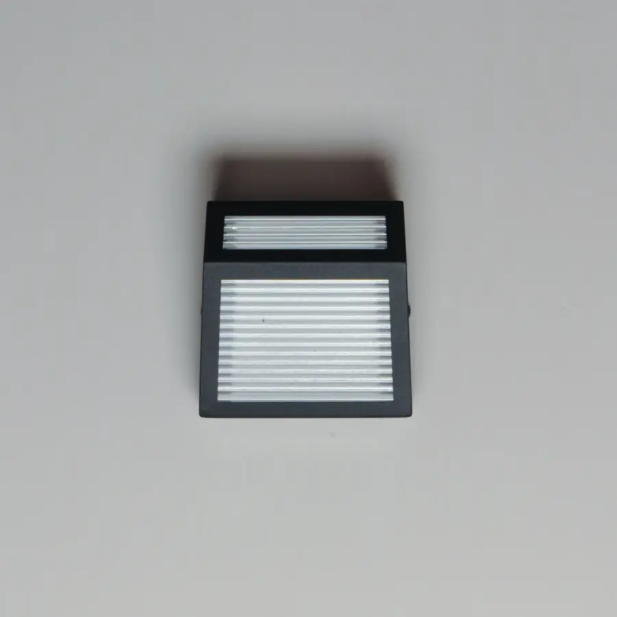 ADA-Compliant Modern Sconce with Striking Ribbed Glass Design - Image 2