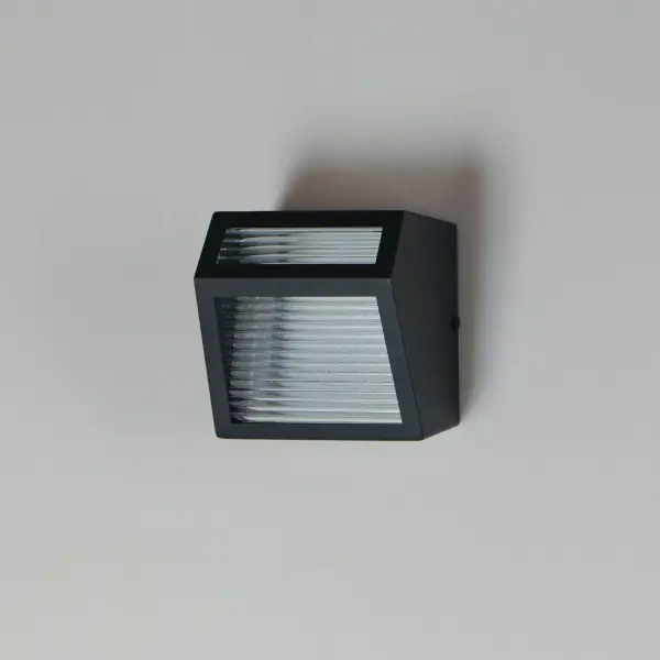 ADA-Compliant Modern Sconce with Striking Ribbed Glass Design - Image 4