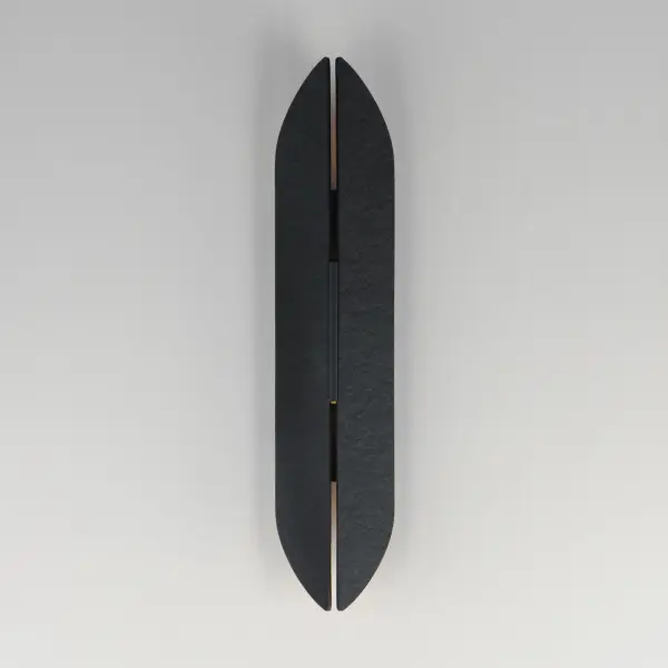 The Tectonic sconce combines architectural drama with functional outdoor lighting. Its textured panels create an enigmatic split design that casts soft ambient light up, down, and through the center crevice. ADA compliant and weather-ready. - alternate view