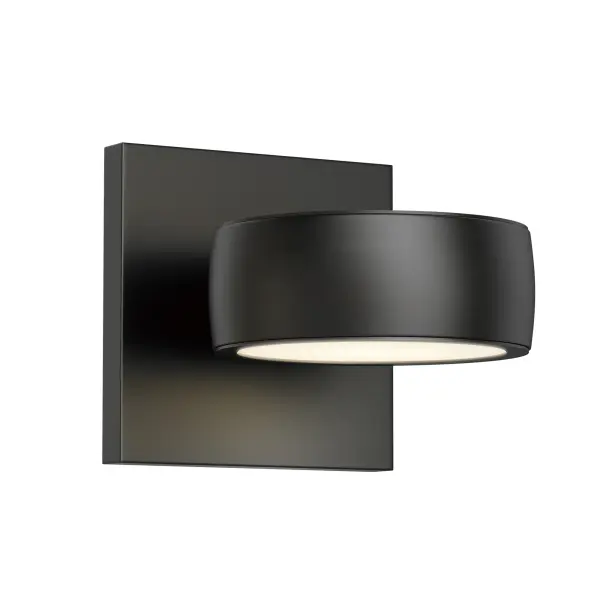 The Modular LED Wall Sconce combines minimalist design with functional outdoor lighting. Its streamlined aluminum construction and modular shade options make it versatile for both residential and commercial applications.