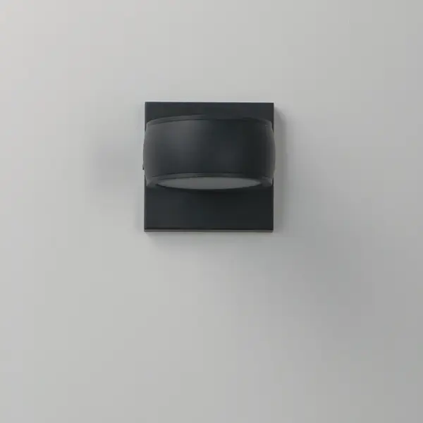 The Modular LED Wall Sconce combines minimalist design with functional outdoor lighting. Its streamlined aluminum construction and modular shade options make it versatile for both residential and commercial applications. - alternate view