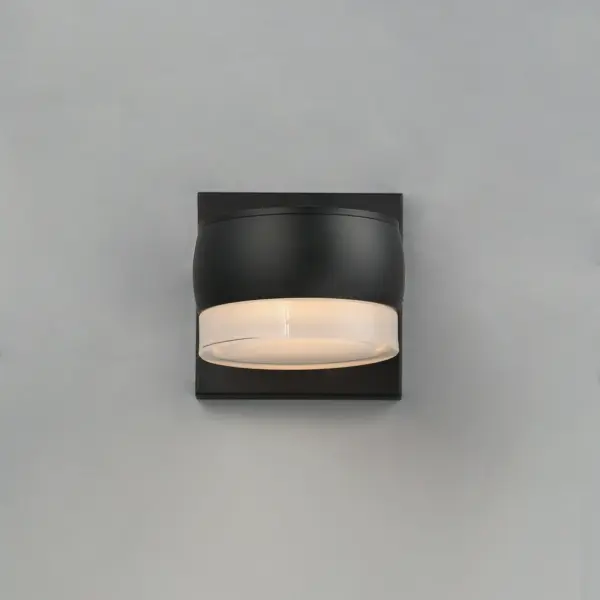The Modular Can LED Sconce combines minimalist design with practical functionality. Its streamlined aluminum disc and modular shade options deliver 450 lumens of warm LED light while meeting Dark Sky standards. - alternate view
