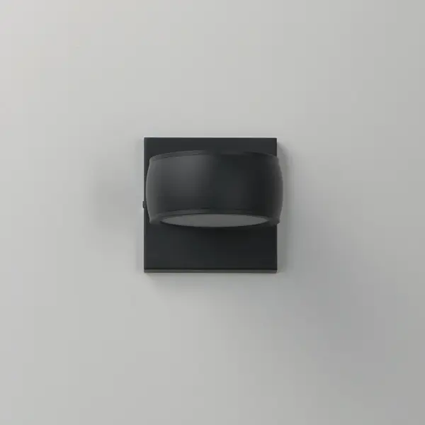 The Modular wall sconce combines minimalist design with functional outdoor lighting. Its streamlined aluminum construction and modular shade options make it versatile for both residential and commercial applications. - alternate view