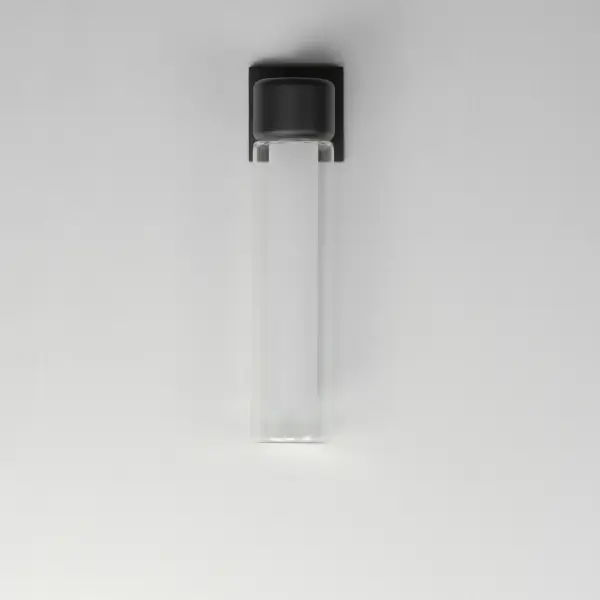 The Dram outdoor wall sconce combines contemporary styling with practical outdoor performance. Dual cylinder glass shades diffuse warm 3000K LED light, while the black powder coat finish resists weather. Wet-rated for full outdoor exposure. - alternate view