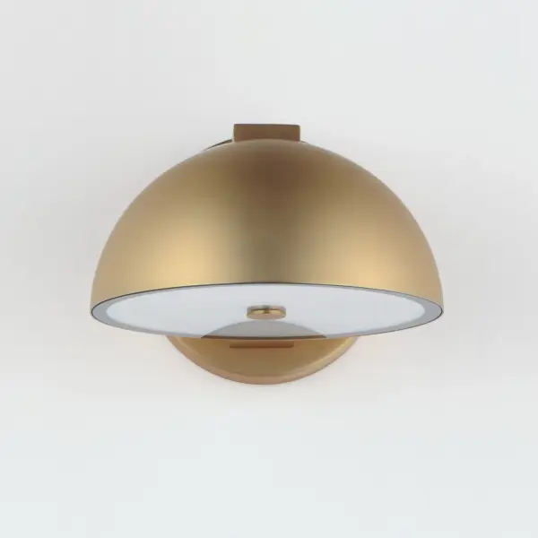 The Cauldron sconce brings dramatic architectural flair with its Olympic cauldron-inspired design. This 7" LED fixture offers flexible installation—upward or downward facing—and delivers 900 lumens of warm 3000K light with excellent 90 CRI color rendering. - alternate view