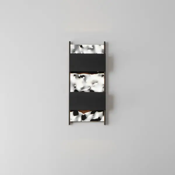The Coulee LED Wall Sconce features a distinctive wave-like water ripple texture in black stainless steel, creating a sophisticated focal point. Built with marine-grade 304 stainless steel and aluminum construction for durability. - alternate view