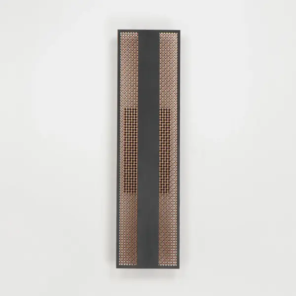 The Interlace outdoor wall sconce features a sophisticated woven stainless steel grid in aged copper, backlit by energy-efficient LED lighting. Its minimal yet elegant design adds architectural interest to any exterior space. - alternate view