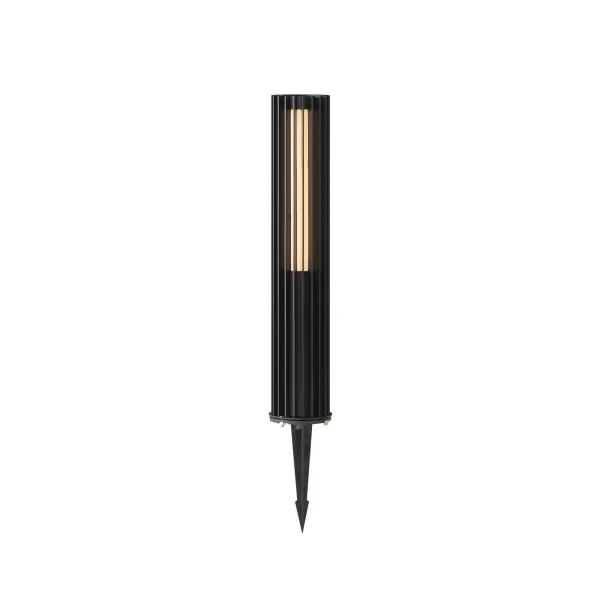 The Citadel pathway light features a sleek contemporary design with vertical aluminum strands surrounding an LED tube. Its slim 4-inch profile makes it ADA compliant while providing 450 lumens of warm 3000K light.