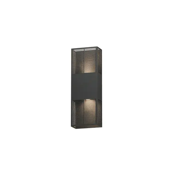 The Grate outdoor wall sconce transforms simple geometry into stunning visual drama. Precision-cut slits cast intricate light patterns across surrounding surfaces, while energy-efficient LED technology delivers warm 3000K illumination.