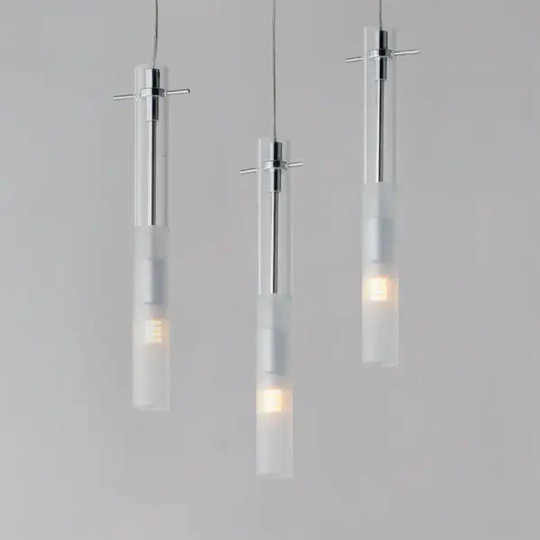 The Pipette pendant creates a striking modern aesthetic with slender clear glass tubes and polished chrome accents. Energy-efficient LED technology combines with etched glass diffusion for soft, ambient lighting perfect for contemporary spaces. - alternate view