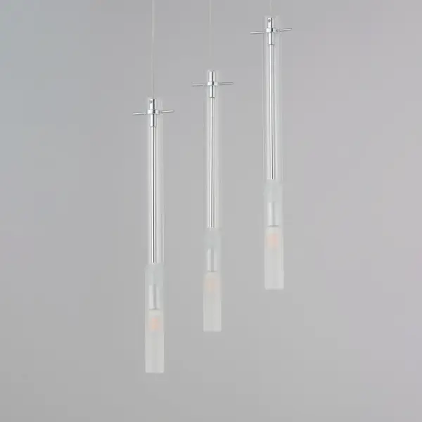 The Pipette pendant creates a striking modern aesthetic with slender clear glass tubes and polished chrome accents. Energy-efficient LED technology combines with etched glass diffusion for warm, inviting illumination. - alternate view