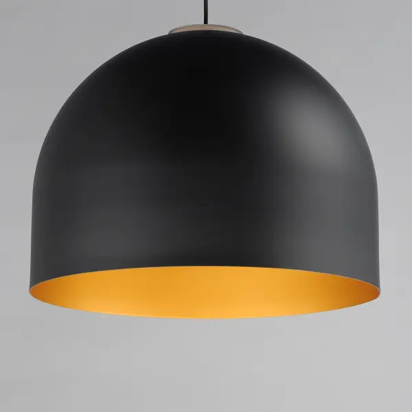 The Foster pendant combines contemporary design with practical functionality, featuring an innovative acrylic reveal that casts light both upward and downward. Its black and gold finish offers sophisticated contrast. - alternate view