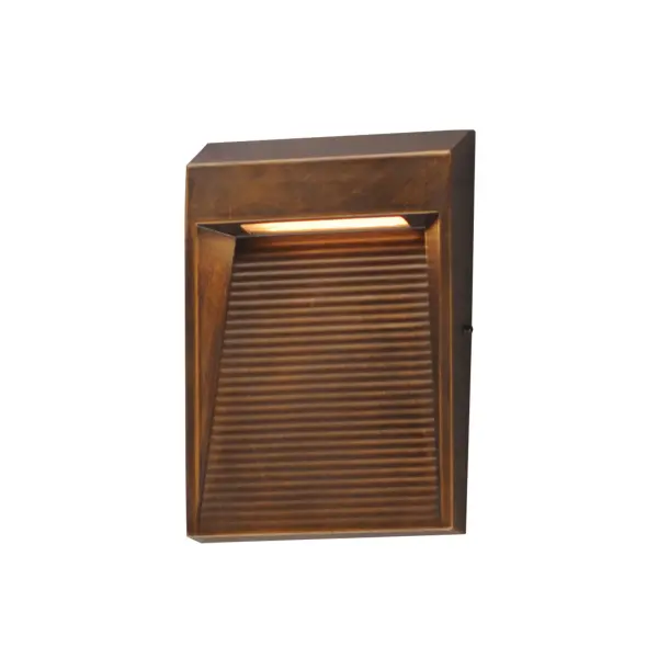 The Steppes LED wall sconce combines minimalist design with functional downlighting. Its slim profile and angular facets create visual interest while the integrated LED casts light across ridged surfaces for dramatic effect.