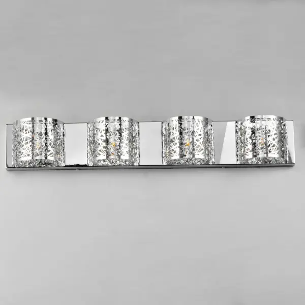 The Steppes LED wall sconce combines minimalist design with functional downlighting. Its slim profile and angular facets create visual interest while the integrated LED casts light across ridged surfaces for dramatic effect. - alternate view