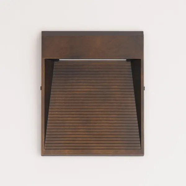 The Steps LED Outdoor Sconce features precisely stacked beveled clear glass in a linear pattern reminiscent of grand city skylines. Its architectural design brings modern sophistication to outdoor spaces with energy-efficient LED technology. - alternate view