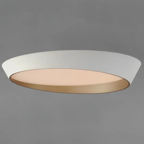 The Slant 31.5" flush mount makes a striking statement with its unique angled profile and two-tone finish. Matte white exterior paired with gold interior creates sophisticated contrast while delivering powerful 3150-lumen LED illumination. - alternate view